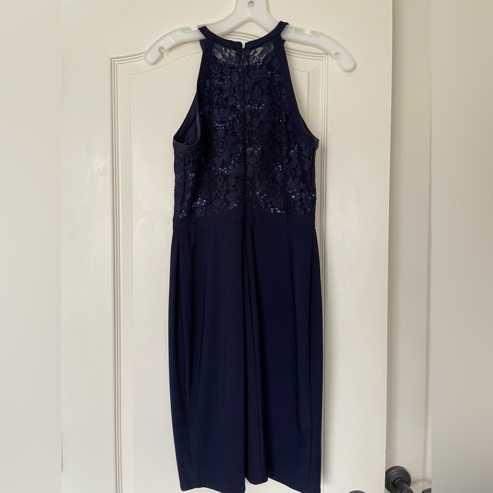 Homecoming dress, navy blue, size 4. Only worn a few times.